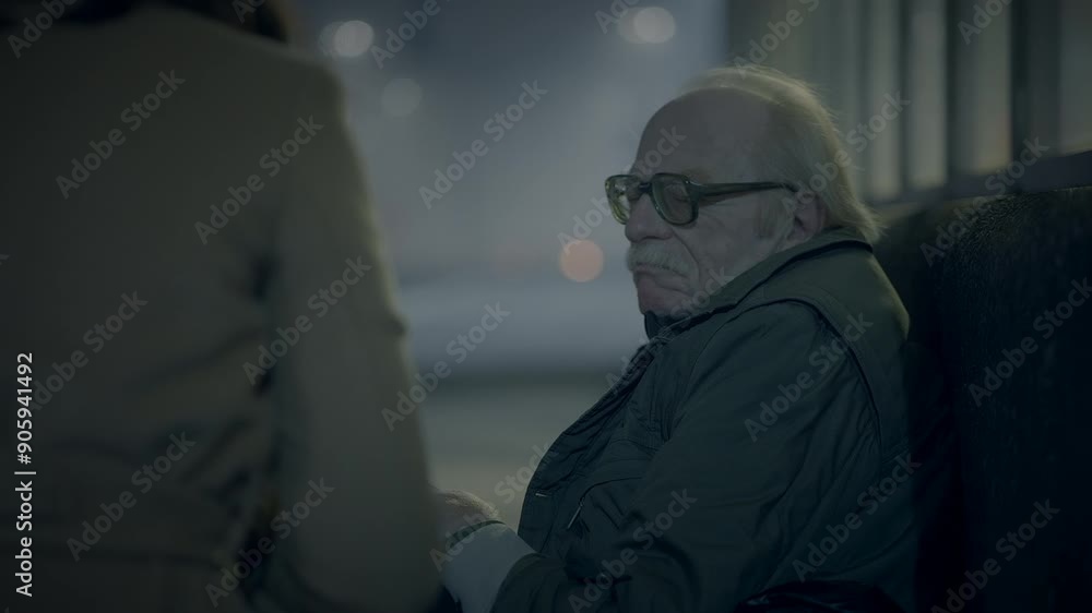 Elderly man on street at night, unknown figure approaching, implying loneliness and vulnerability