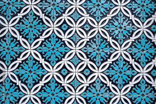 ceramic tile mosaic with traditional oriental Arabic Islamic Uzbek pattern decorated with blue and white ornament