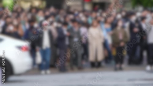 Wallpaper Mural Blurred defocused of a lively procession of pedestrians floods the Shibuya Crossing in Japan, creating a mesmerizing display of movement and energy. Torontodigital.ca