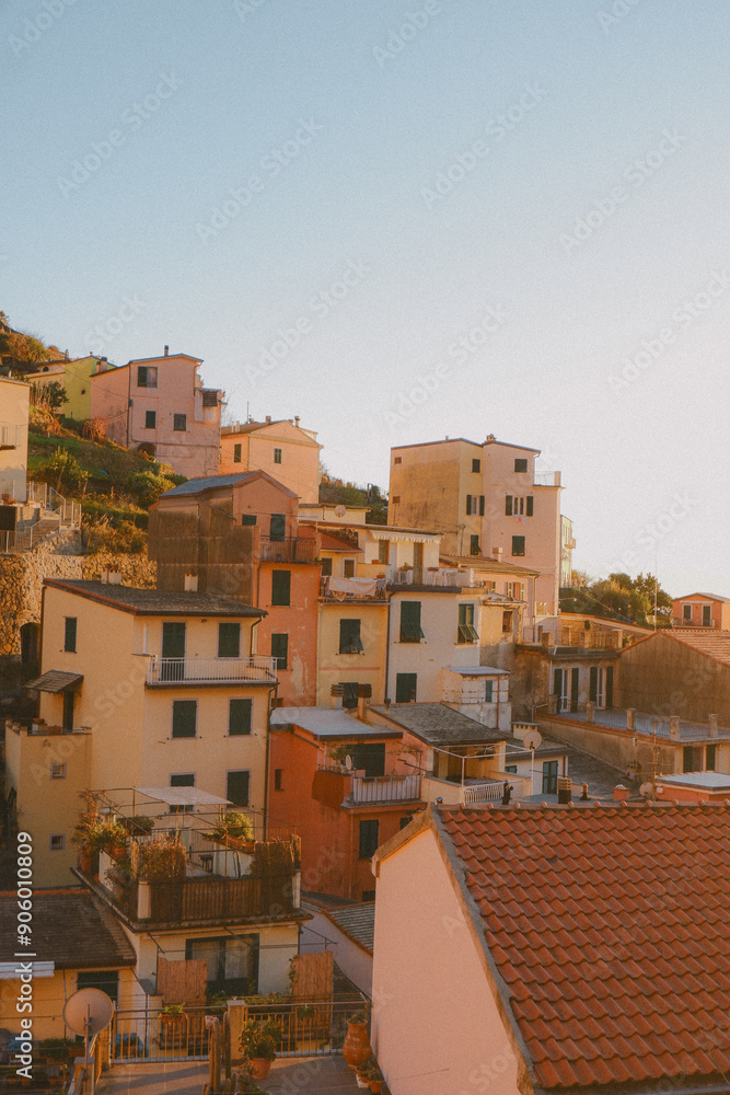 Obraz premium View of Riomaggiore in Cinque Terre, Italy during golden hour.