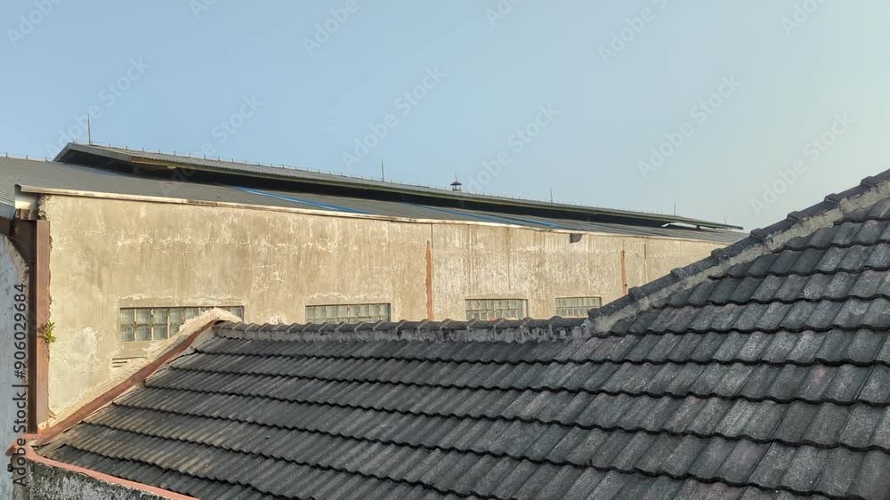 view rooftop abandoned industrial site in Bandung, Indonesia, with blue sky in the morning, industrial, stock video, 4K. view rooftop abandoned industrial site in Bandung, Indonesia, with blue sky in the morning, industrial, stock video, 4K.