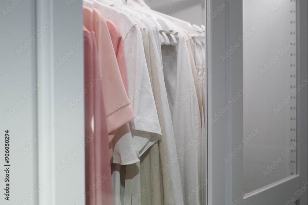 A Stylish Wardrobe Featuring Elegant Fashion Apparel Neatly Hanging for Easy Access A Stylish Wardrobe Featuring Elegant Fashion Apparel Neatly Hanging for Easy Access