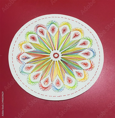 Hand made colorful, String Art Mandala embossed on handmade paper
