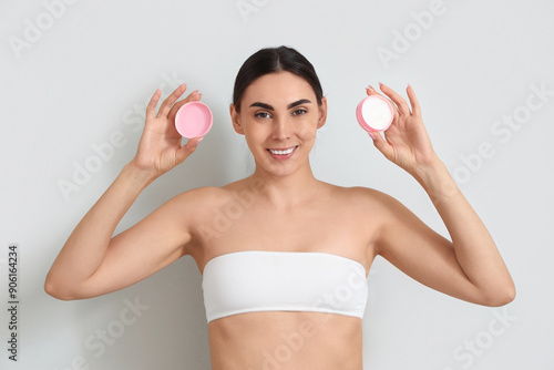 Pretty young woman with fac...