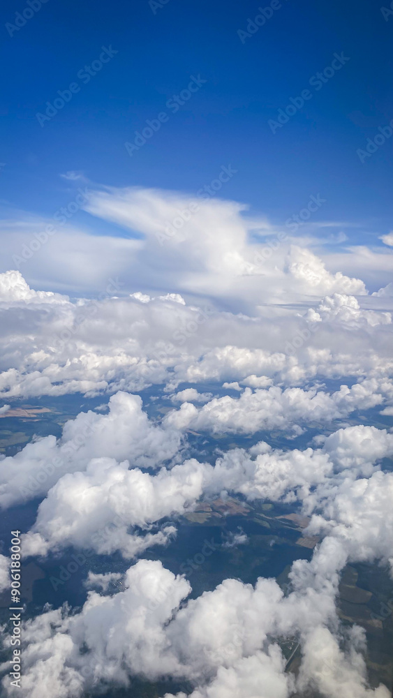 view from the plane, blue sky with clouds view from the plane, blue sky with clouds