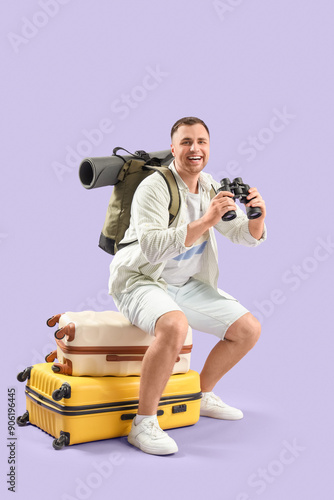 Male tourist with backpack ...
