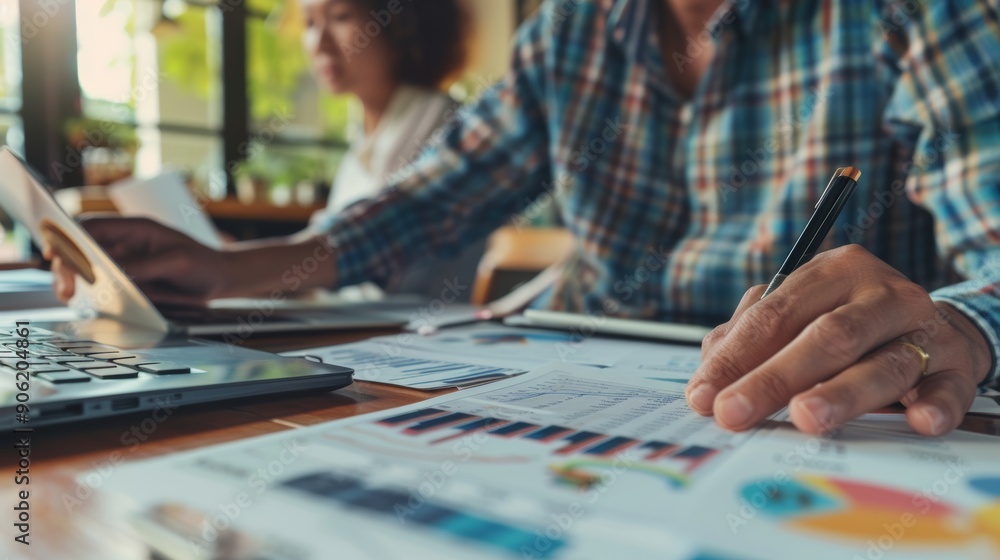 Business consultant meeting is discussing financial situation Business consultant meeting is discussing financial situation