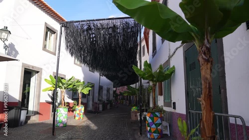 Funchal, Madeira Island, Portugal. Cobbled Narrow Street, Buildings and Decorations