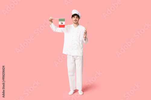 Young male chef with whisk ...