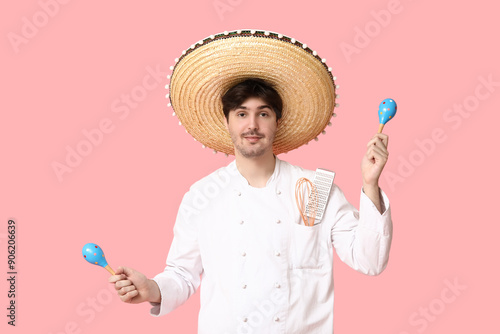 Young male chef with sombre...