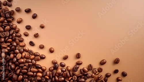 fresh coffee beans on Brown background
