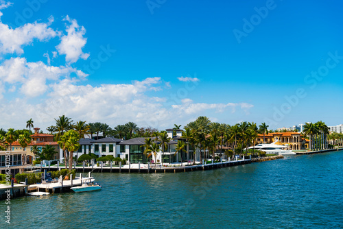 Vacation in summer paradise. Luxury house apartment. Travel to bay at Florida neighborhood. Summer vacation in tropical residential house. Luxury summer villa with yacht pier. Scenic cityscape