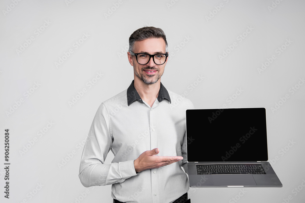 Business success. CEO manager businessman isolated on grey. Video conferencing. Successful business man using laptop. Businessman work online. Online marketing manager. Copy space Business success. CEO manager businessman isolated on grey. Video conferencing. Successful business man using laptop. Businessman work online. Online marketing manager. Copy space
