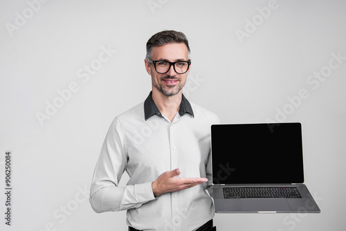 Business success. CEO manager businessman isolated on grey. Video conferencing. Successful business man using laptop. Businessman work online. Online marketing manager. Copy space