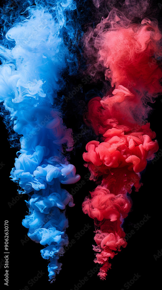 Vibrant blue and red paint swirl together in water, forming dynamic patterns suspended against a dark backdrop Vibrant blue and red paint swirl together in water, forming dynamic patterns suspended against a dark backdrop