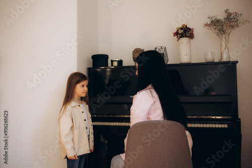 A little girl at a music school lesson