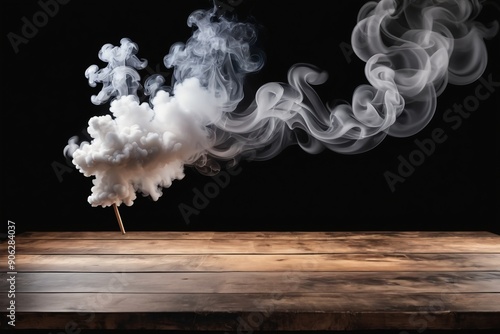 Blank old weathered wooden tabletop against grunge misty smoked wall in empty dark room photo