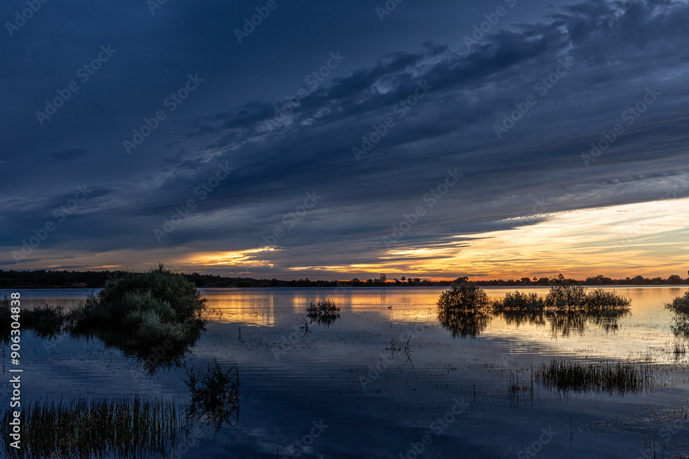 Fototapeta premium Vegetation and Valtabuyo Reservoir at dawn, Tabuyo del Monte, León, Spain.