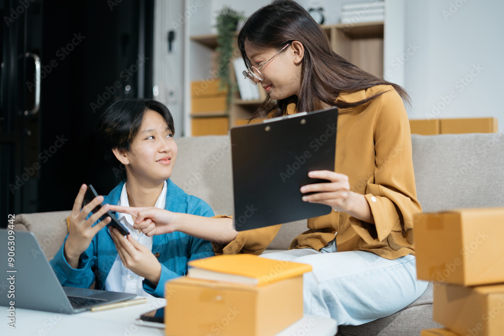 Couple start up small business owner. small business entrepreneur SME or freelance asian couple working with selling products online. Couple start up small business owner. small business entrepreneur SME or freelance asian couple working with selling products online.