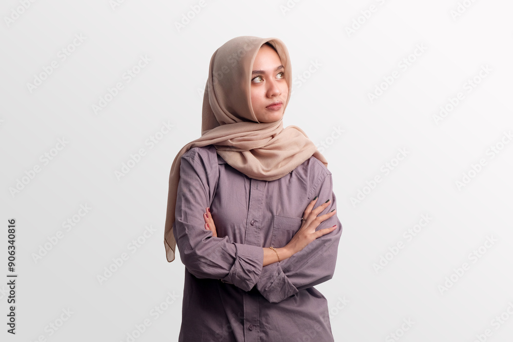 Asian Muslim woman looking away, isolated in white background Asian Muslim woman looking away, isolated in white background