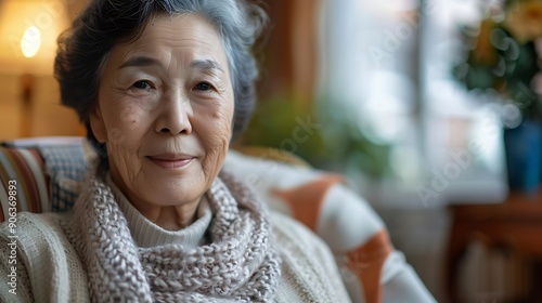 Happy portrait and senior woman relax on a chair in nursing home with security safety and elderly care confidence Smile face and calm old lady person in peaceful retirement house livin : Generative AI photo