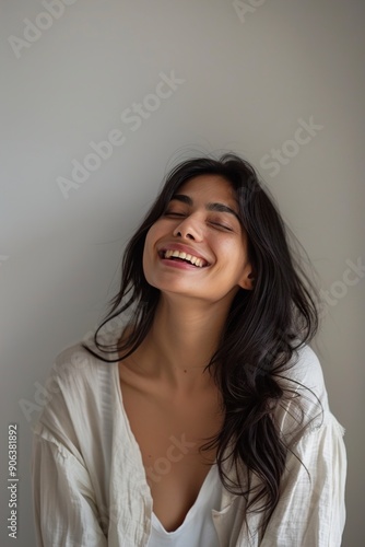 A Portrait of a glad indian woman in her laughing