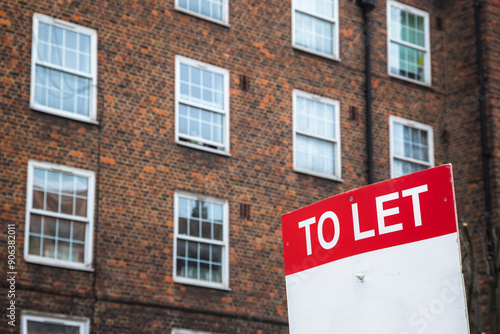 To Let sign with council housing flats in the background in London