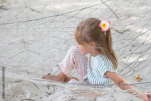 girl swinging in a hammock