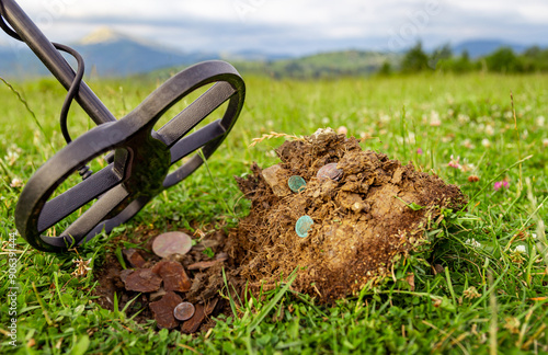 Wallpaper Mural Treasure hunter with a metal detector in the mountains. Torontodigital.ca