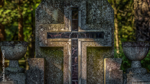 CEMETERY - An old crucifix on a  grave photo