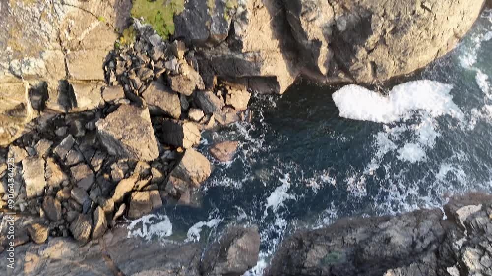 Aerial view of a a stone pillar at the beautiful coastline at Dawros in County Donegal - Ireland Aerial view of a a stone pillar at the beautiful coastline at Dawros in County Donegal - Ireland