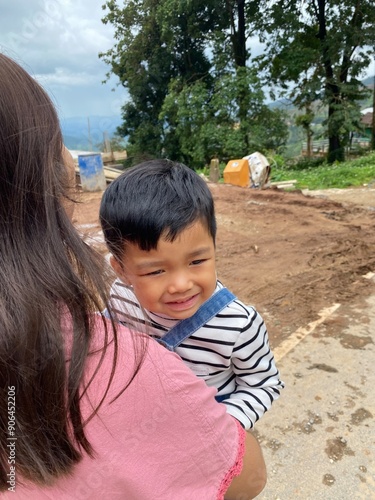 Wallpaper Mural Mother and son enjoying a sunny day at the park, smiling and having fun togethe Torontodigital.ca