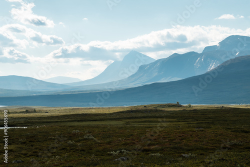 Padjelanta National Park in swedish lapland. On a hiking outdoor adventure. Beautiful Scenery view from nordkalottleden close to kutjaurestugan towards Nijak and Gisuris Mountain.