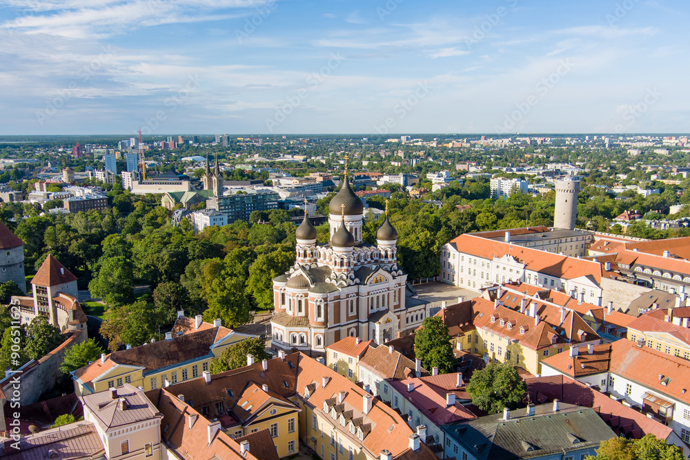 Fototapeta premium Aerial view of Alexander Nevsky Cathedral in Tallinn Old Town on a sunny summer morning. St. Mary's Cathedral, defensive walls, rooftops.