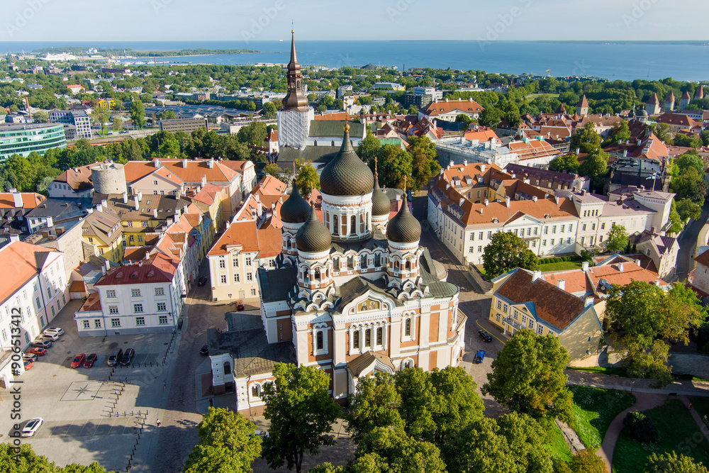 Fototapeta premium Aerial view of Alexander Nevsky Cathedral in Tallinn Old Town on a sunny summer morning. St. Mary's Cathedral, defensive walls, rooftops.