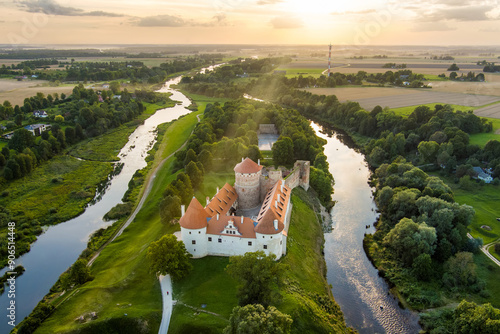 Aerial view of Bauska Castle or Bauskas pils. Ruins of Livonian Order Castle and a later palace, residence of the Duke of Courland and home to the Castle Museum today. photo