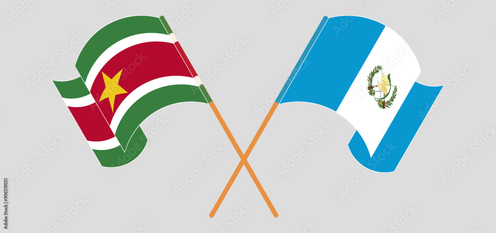 Crossed and waving flags of Suriname and Republic of Guatemala Crossed and waving flags of Suriname and Republic of Guatemala
