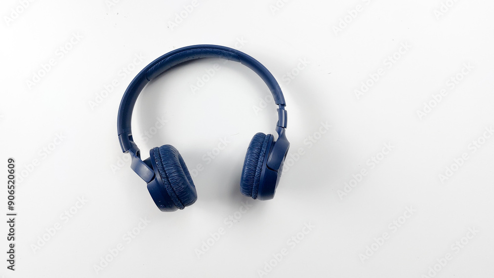 Fototapeta premium Headphones isolated on white background. Music concept. Top view.