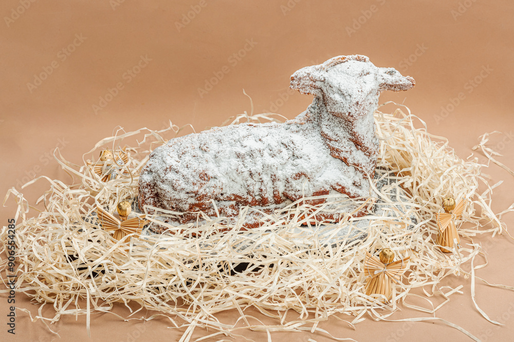 Christmas lamb cake with traditional New Year decor. Baked sweet dessert with sugar icing Christmas lamb cake with traditional New Year decor. Baked sweet dessert with sugar icing