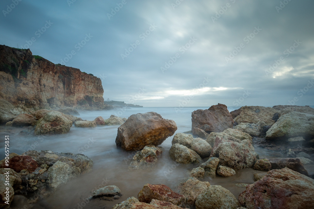 Praia do Molhe, rocks and fog, Ferragudo Portimao Algarve. Praia do Molhe, rocks and fog, Ferragudo Portimao Algarve.