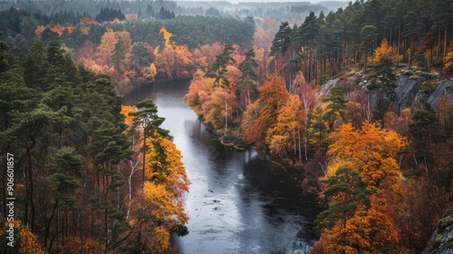 A river with trees on both sides and a beautiful autumn scene photo