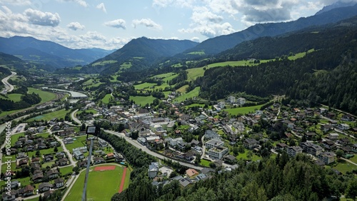 Fotografie stunning high view of town beside thew river and mountains
