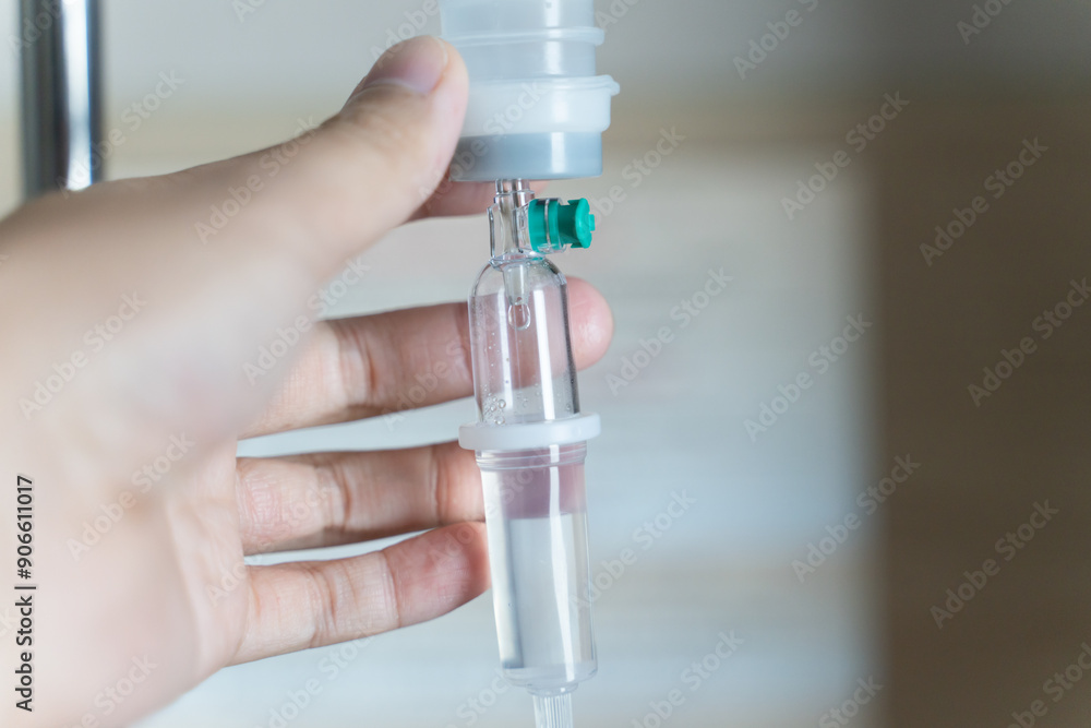 Close up medical intravenous IV drip, Saline bag for hospital patients, saline close up, health, Saline bottle hanging. Close up medical intravenous IV drip, Saline bag for hospital patients, saline close up, health, Saline bottle hanging.