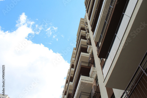 building with sky, new apartment building on the background of the blue sky., 