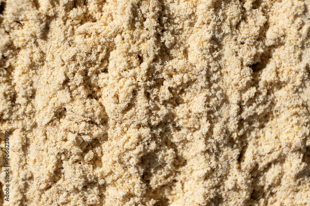 Macro spilled ginger powder, ground ginger root top view Macro spilled ginger powder, ground ginger root top view