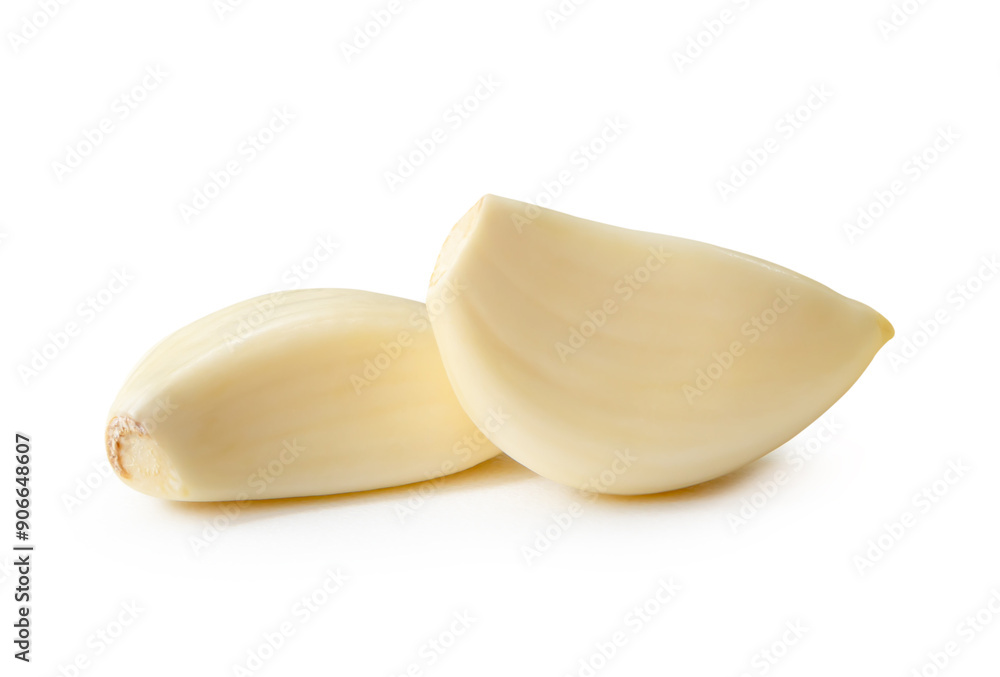 Side view of peeled white garlic cloves in stack isolated on white background with clipping path Side view of peeled white garlic cloves in stack isolated on white background with clipping path