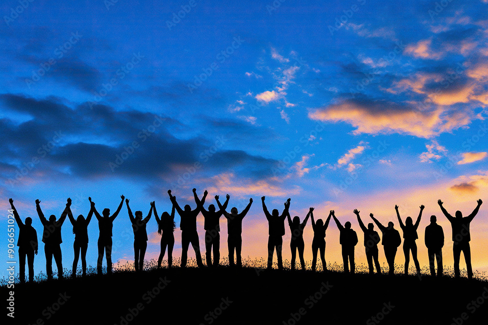 Silhouettes of group people men and women standing in celebration their victory at sunset Silhouettes of group people men and women standing in celebration their victory at sunset