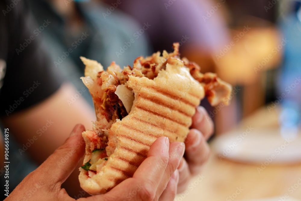 a man eats fast food