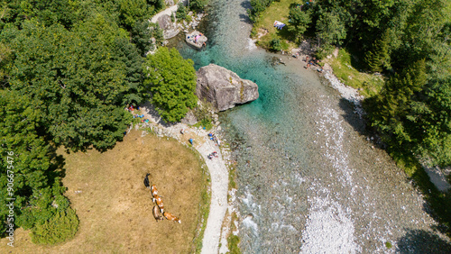 Aerial view of Val di Mello, a green valley surrounded by granite mountains and woods, renamed the Italian Yosemite Valley by nature lovers. Val Masino, Valtellina, Sondrio. Italy