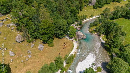 Canvas Print Aerial view of Val di Mello, a green valley surrounded by granite mountains and woods, renamed the Italian Yosemite Valley by nature lovers